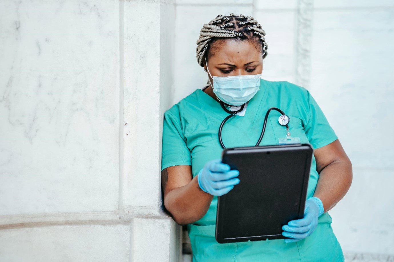 a doctor examining charts