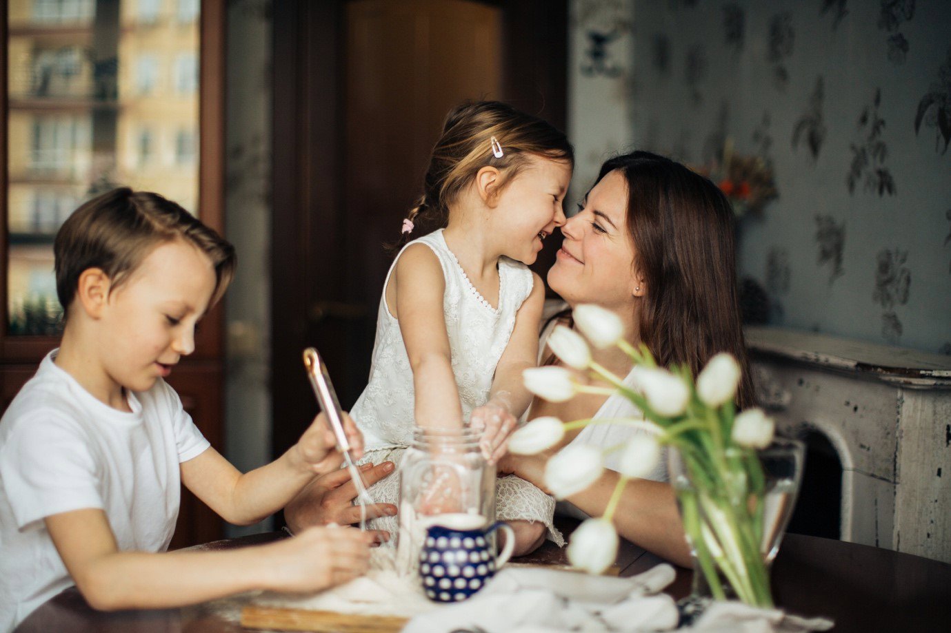 A mother spending time with her children