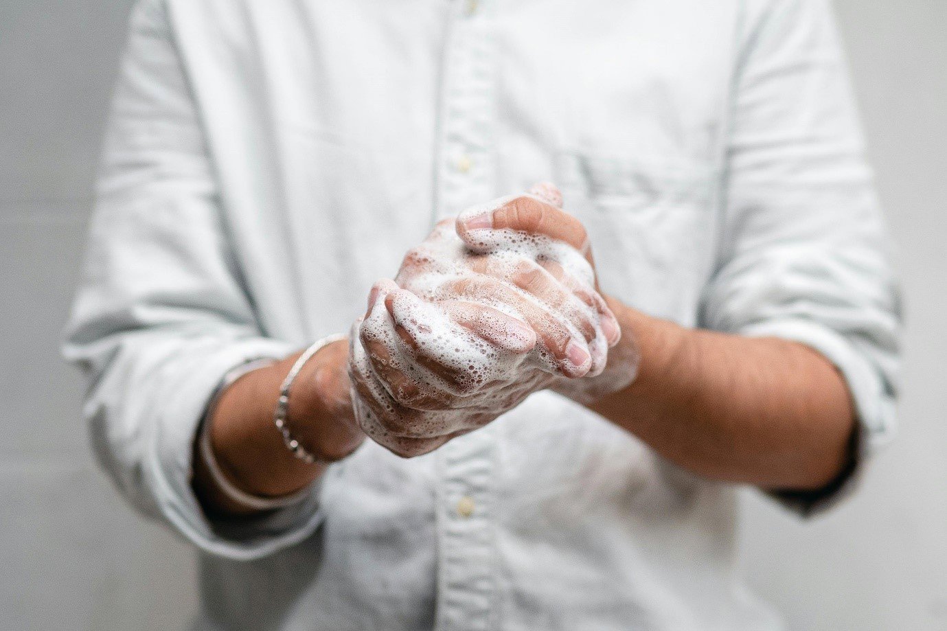 A man washing his hands