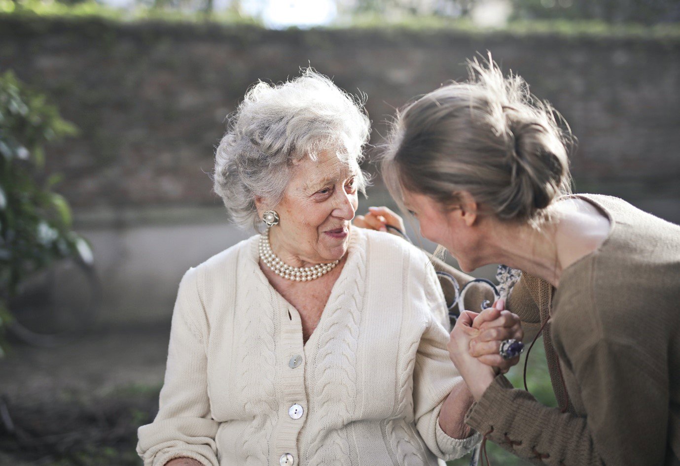 Two older women in conversation