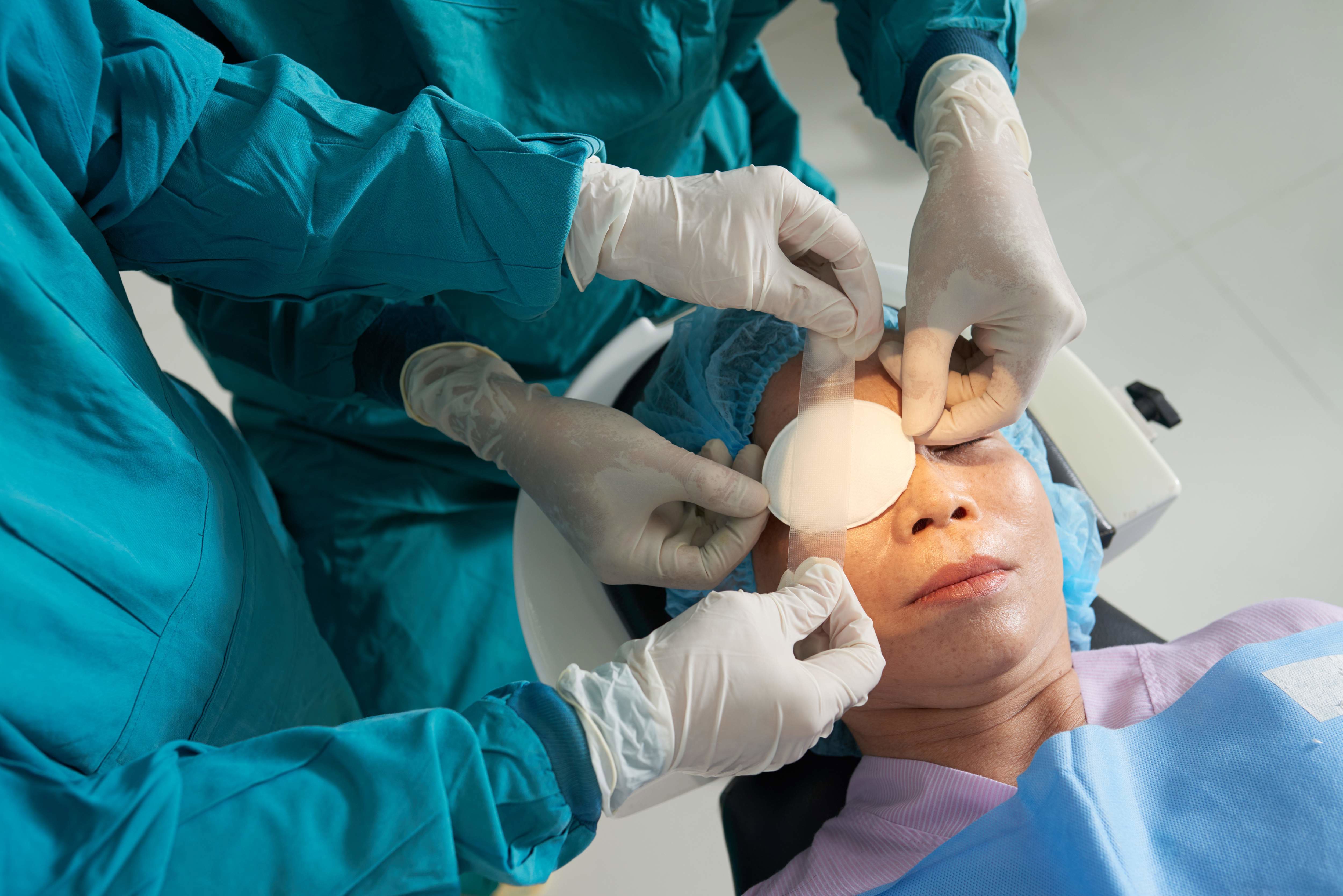 a woman undergoing eye surgery