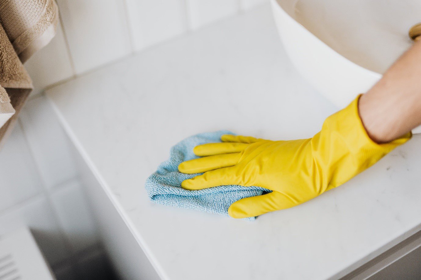 washing up wearing gloves